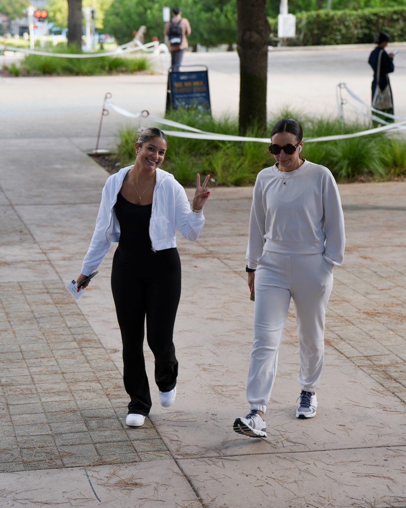 Two students walking on campus