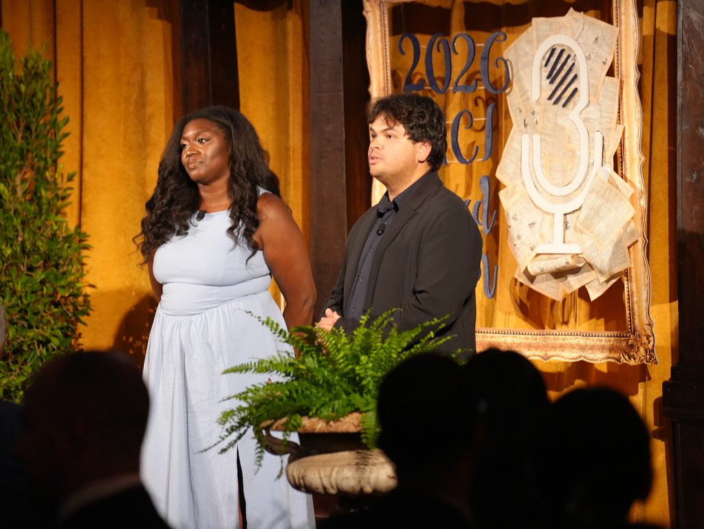 Onwodi Ifejeokwu and Casey Vanderlip on stage