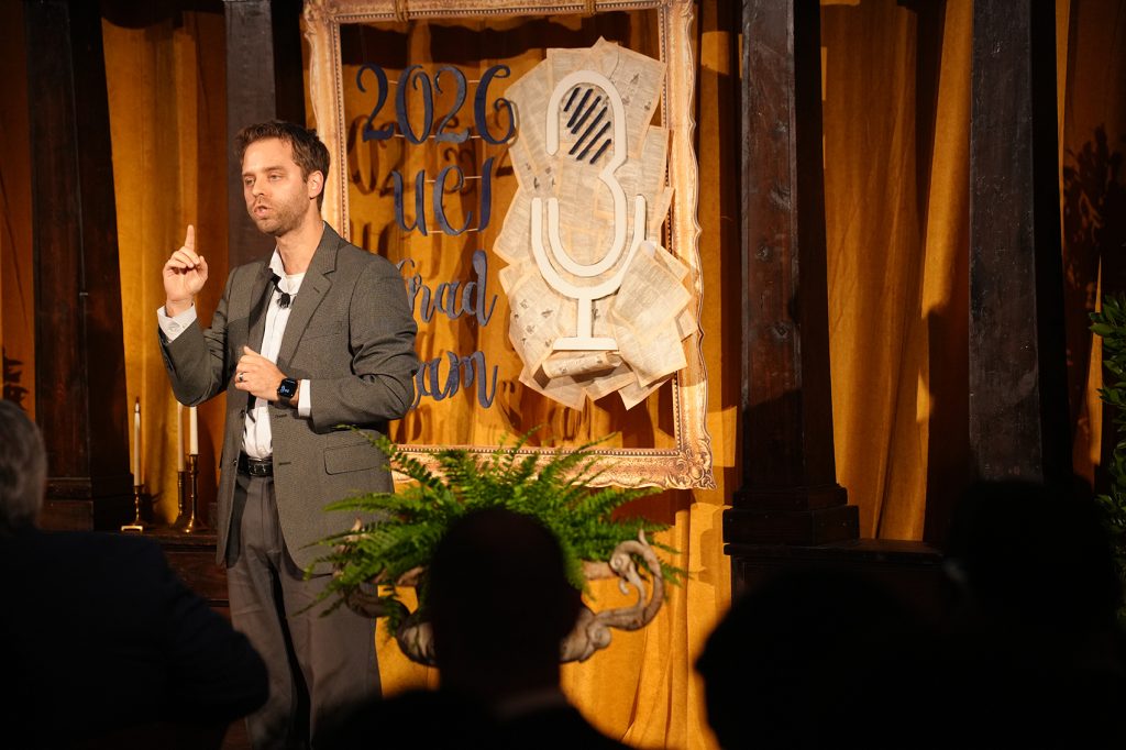 Cameron Geller presenting on stage
