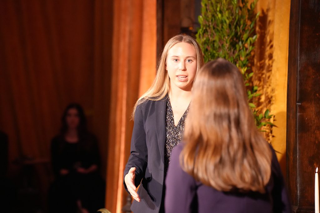 Emma Caudill speaking to Bri McWhorter