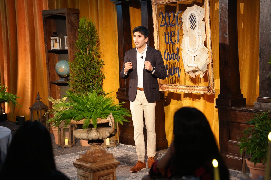 Mehdi Zafari presenting on stage